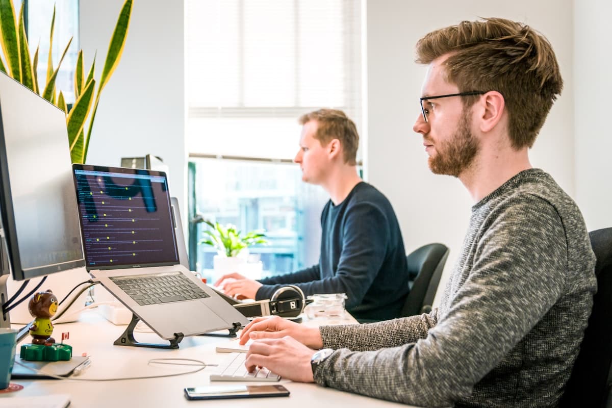 Modern office team collaborating on Microsoft tools